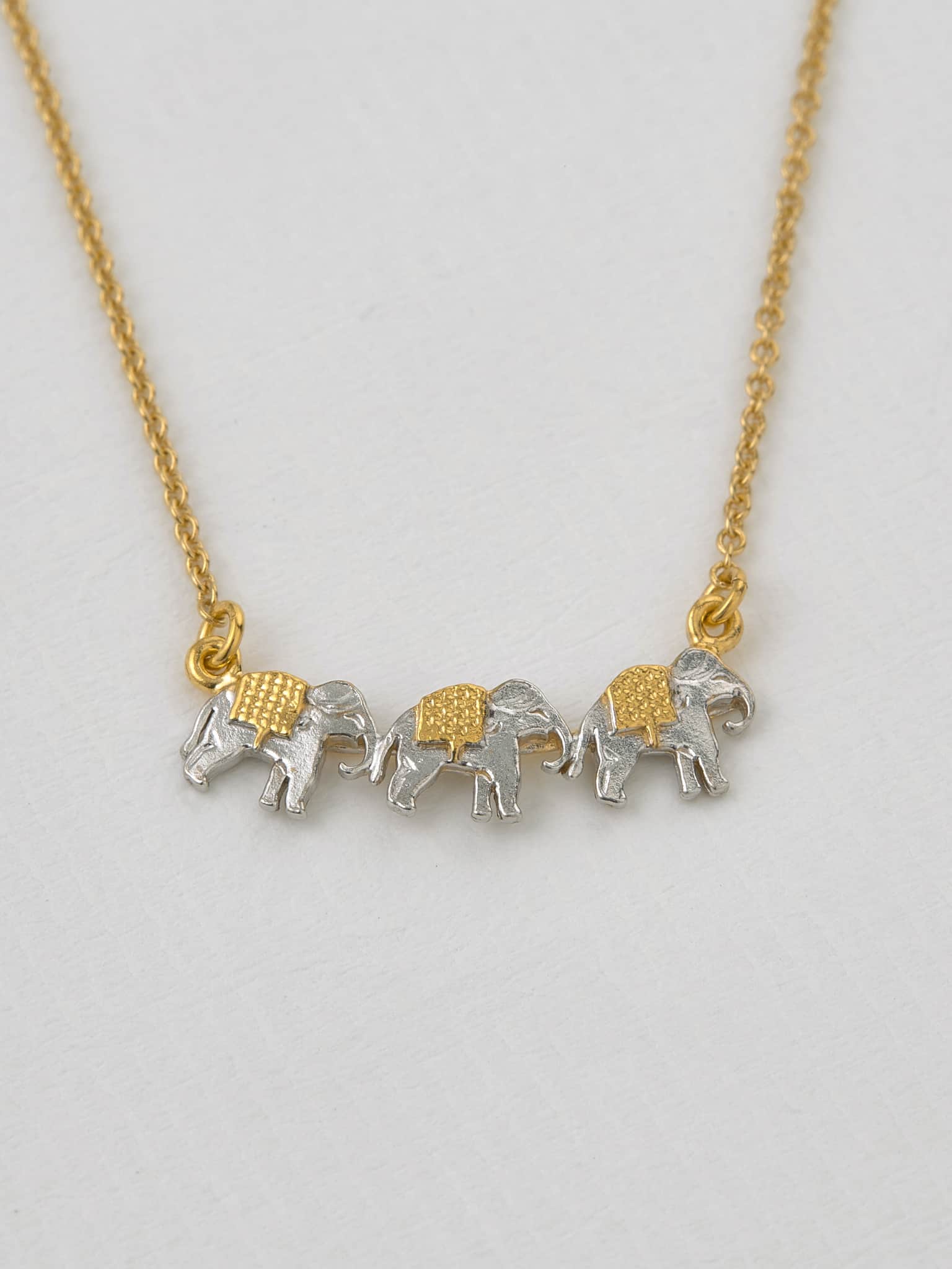 Marching Elephants Necklace - image 3 | silver & gold plate