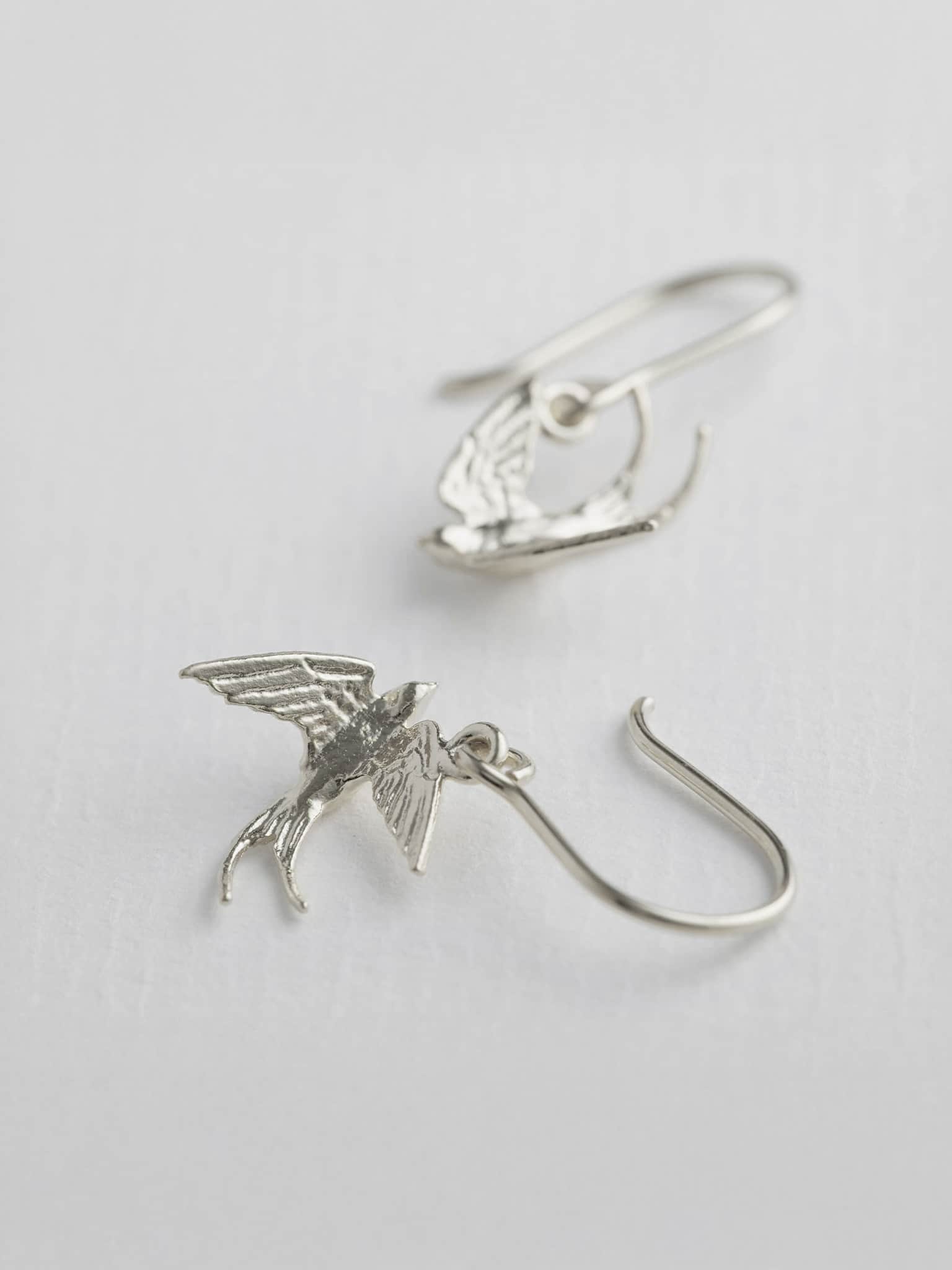 Swooping Swallow Hook Earrings - image 6 | silver