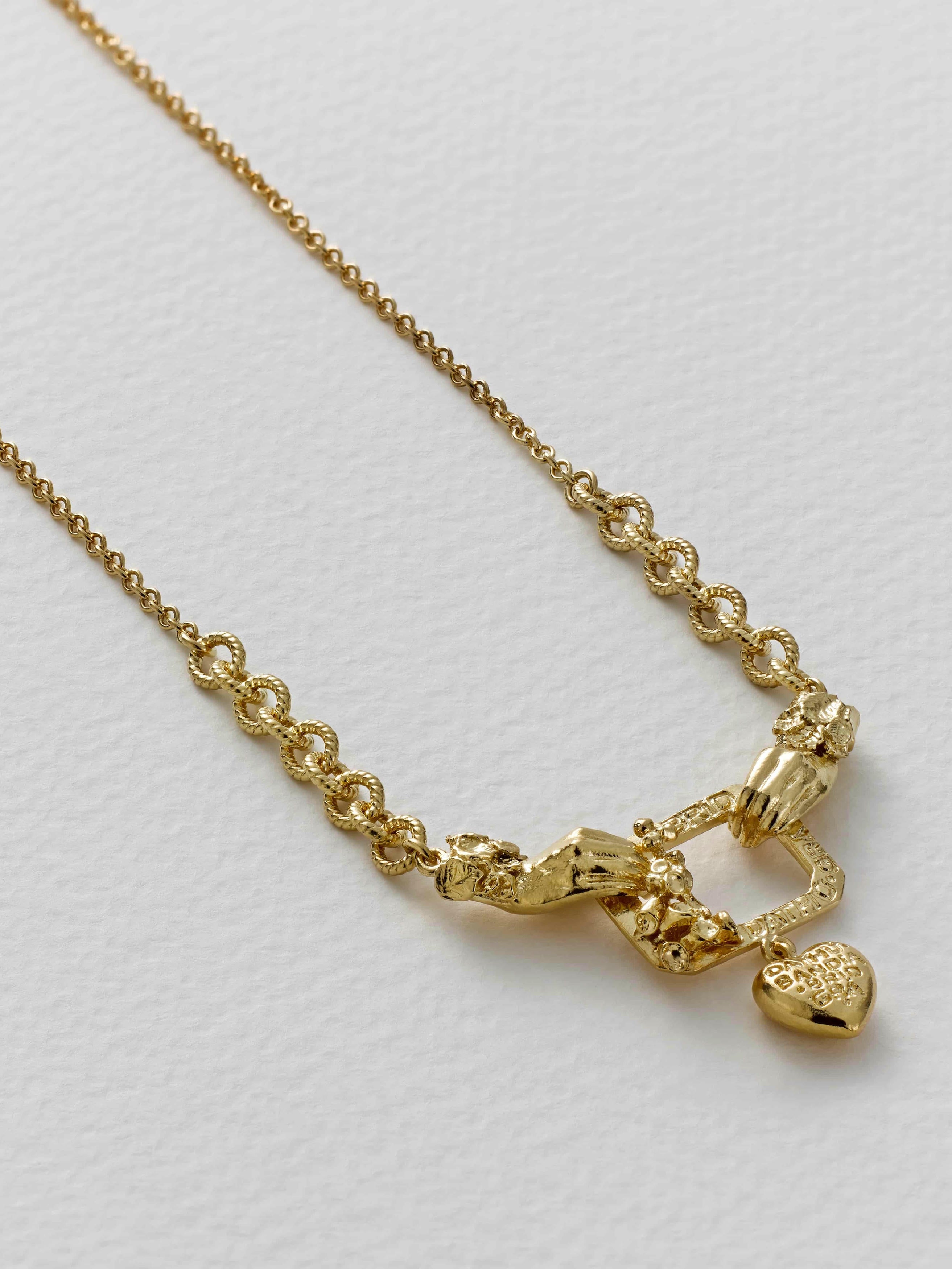 AM x Emma Dabiri Graduated Claddagh Foxglove Frame Necklace - image 4 | gold plate