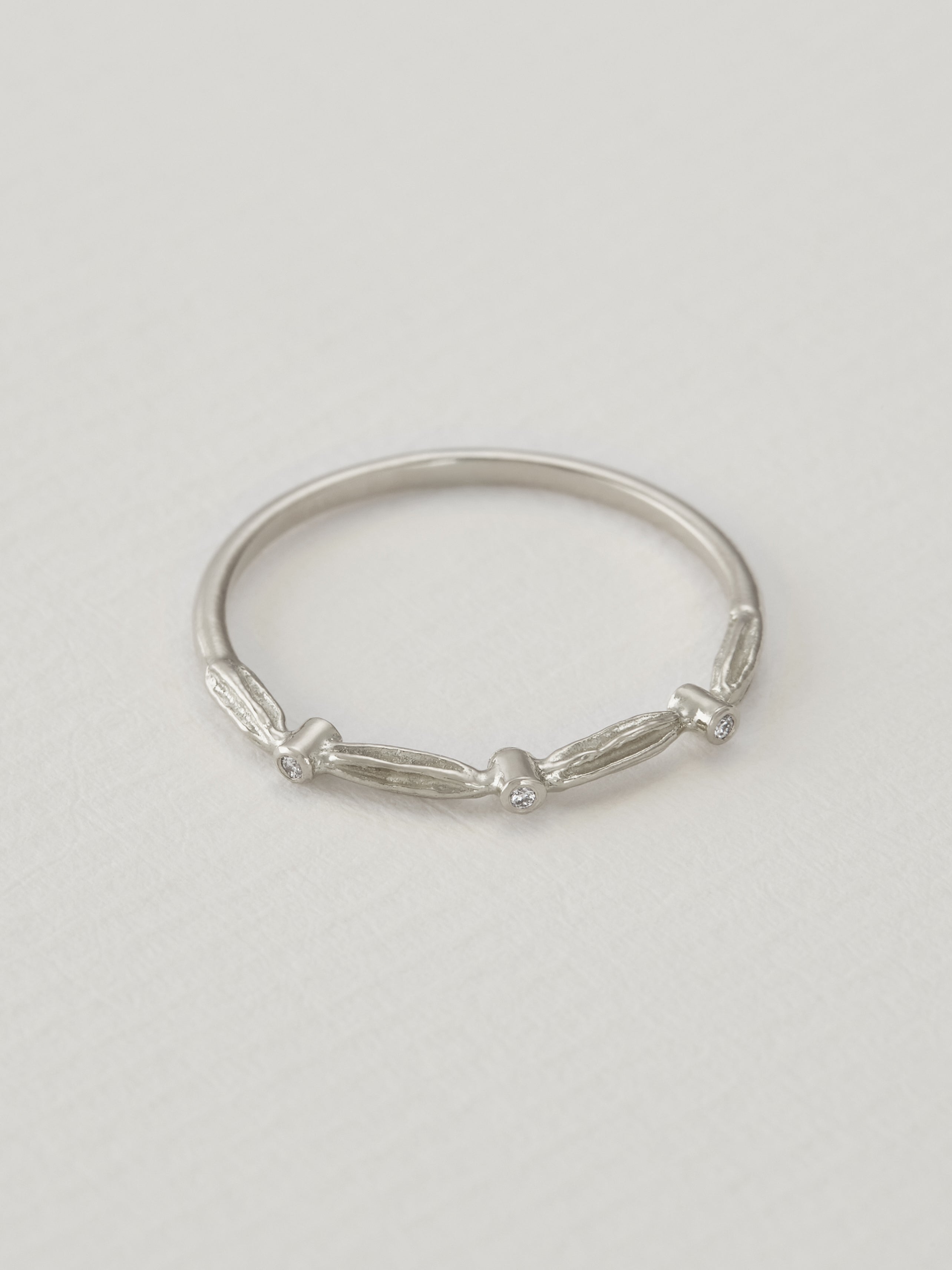 Kissing Seed Band Ring with Three Diamonds - image 5 | 18ct white gold