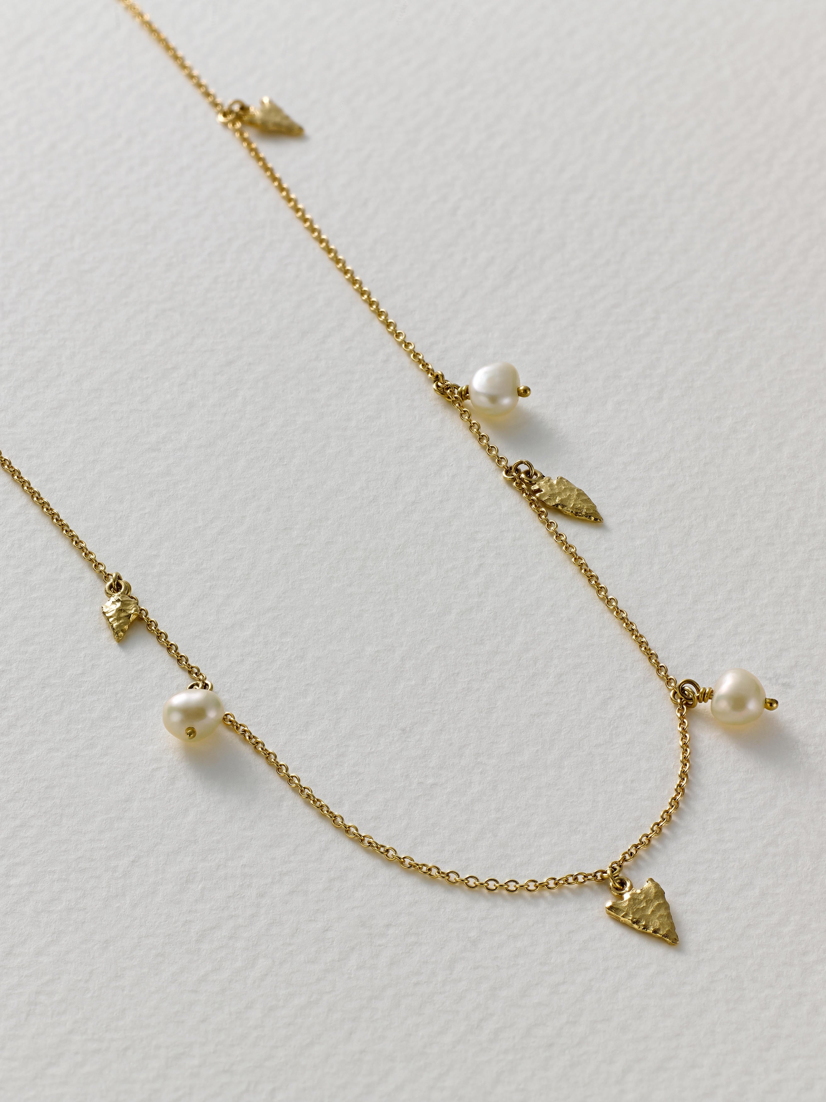 Flint Arrowhead and Freshwater Pearl Station Necklace - image 5 | 18ct yellow gold