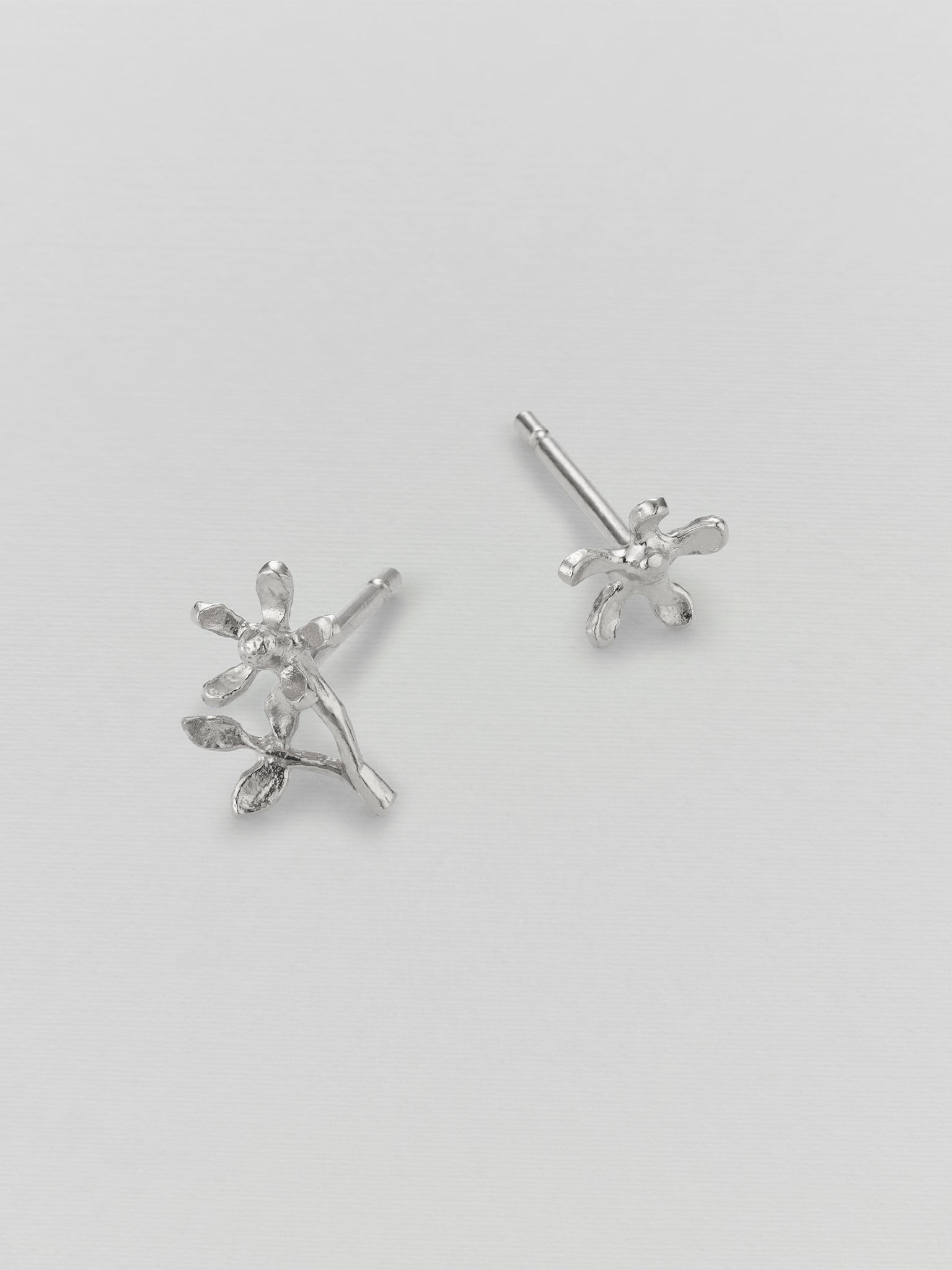 Asymmetric Growing Flower Stud Earrings - image 6 | silver