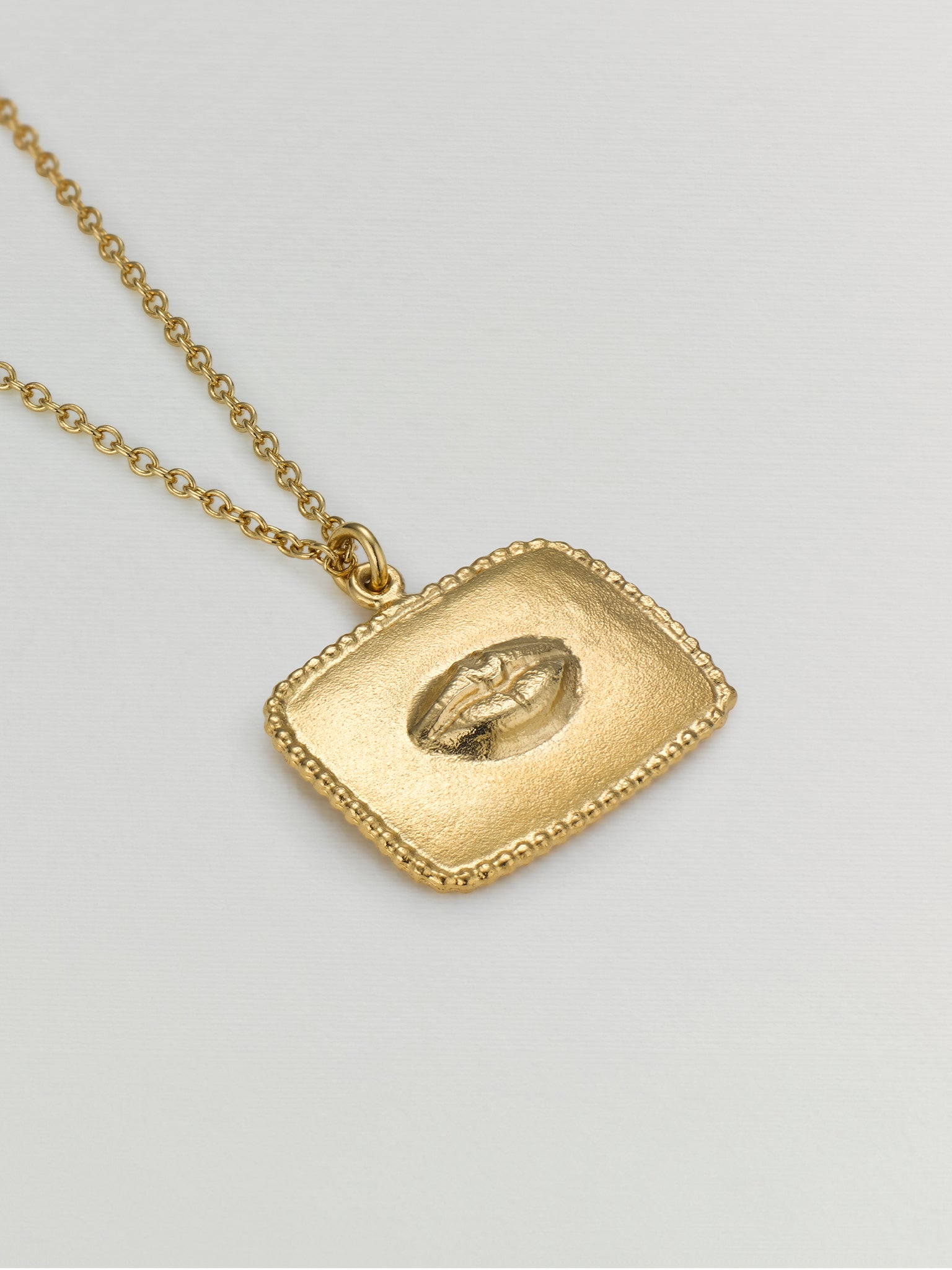 Sense of Taste Lips Pendant Necklace Engraved with Strawberries on Reverse - image 3 | gold plate