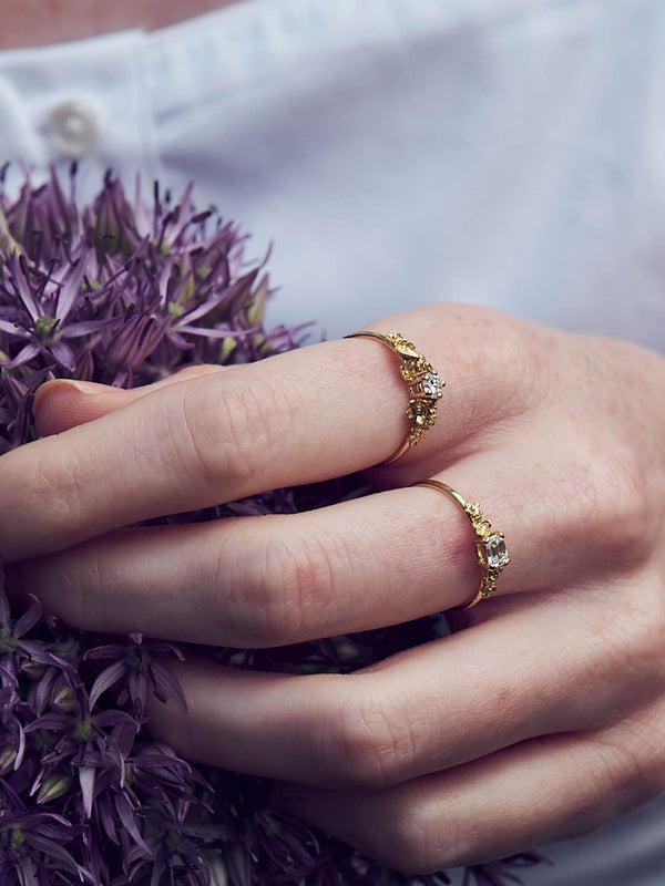 Fine Ring with 0.25ct Emerald Cut Diamond & Floral Details