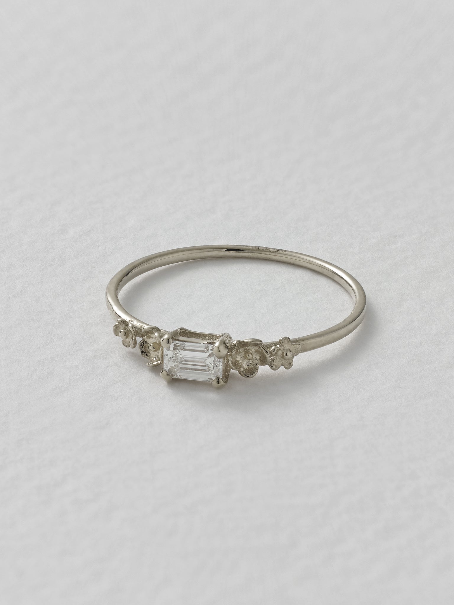 Fine Ring with 0.25ct Emerald Cut Diamond & Floral Details - image 10 | platinum