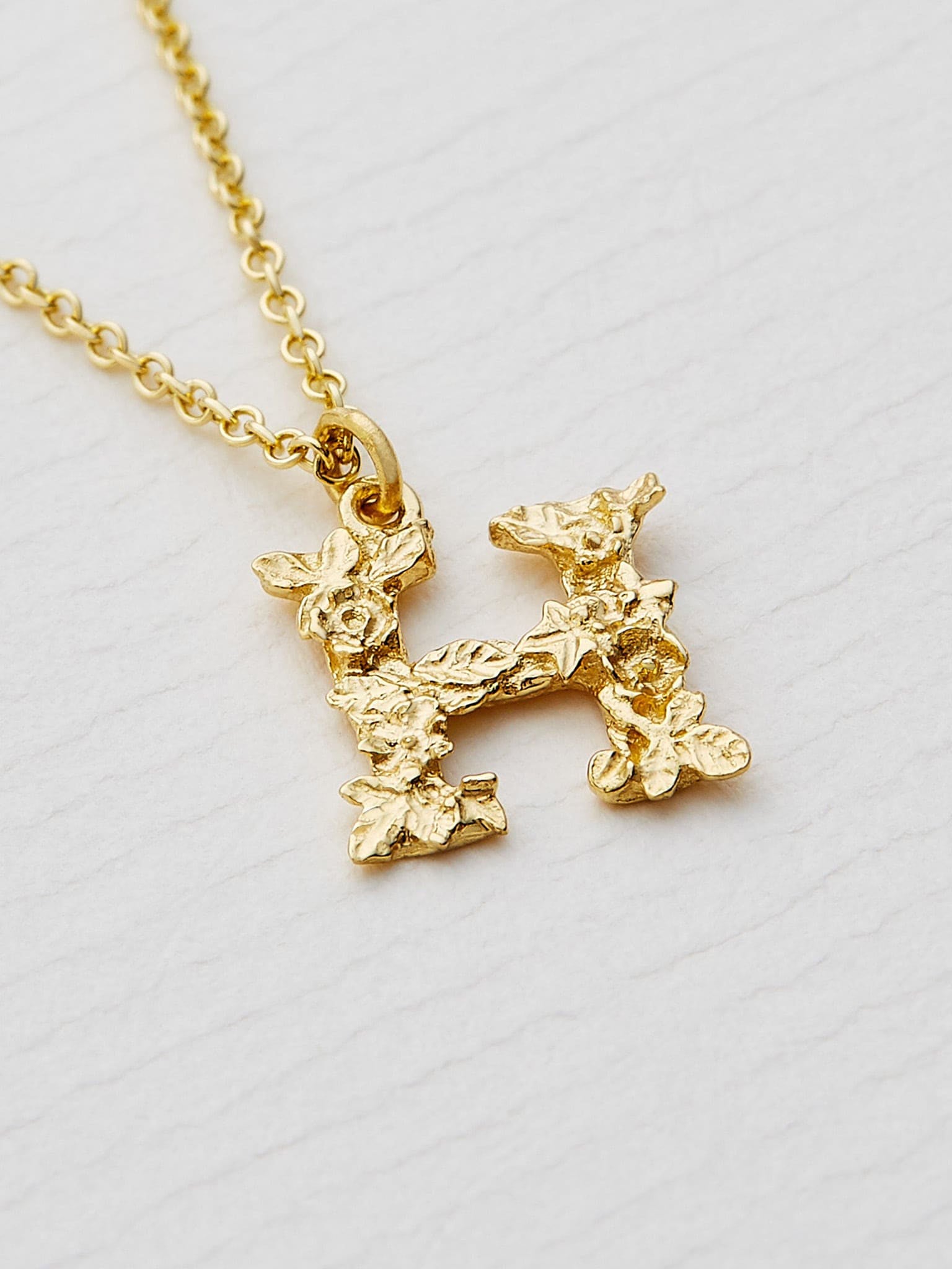 Teeny Tiny Floral Letter H Necklace - image 3 | 18ct yellow gold