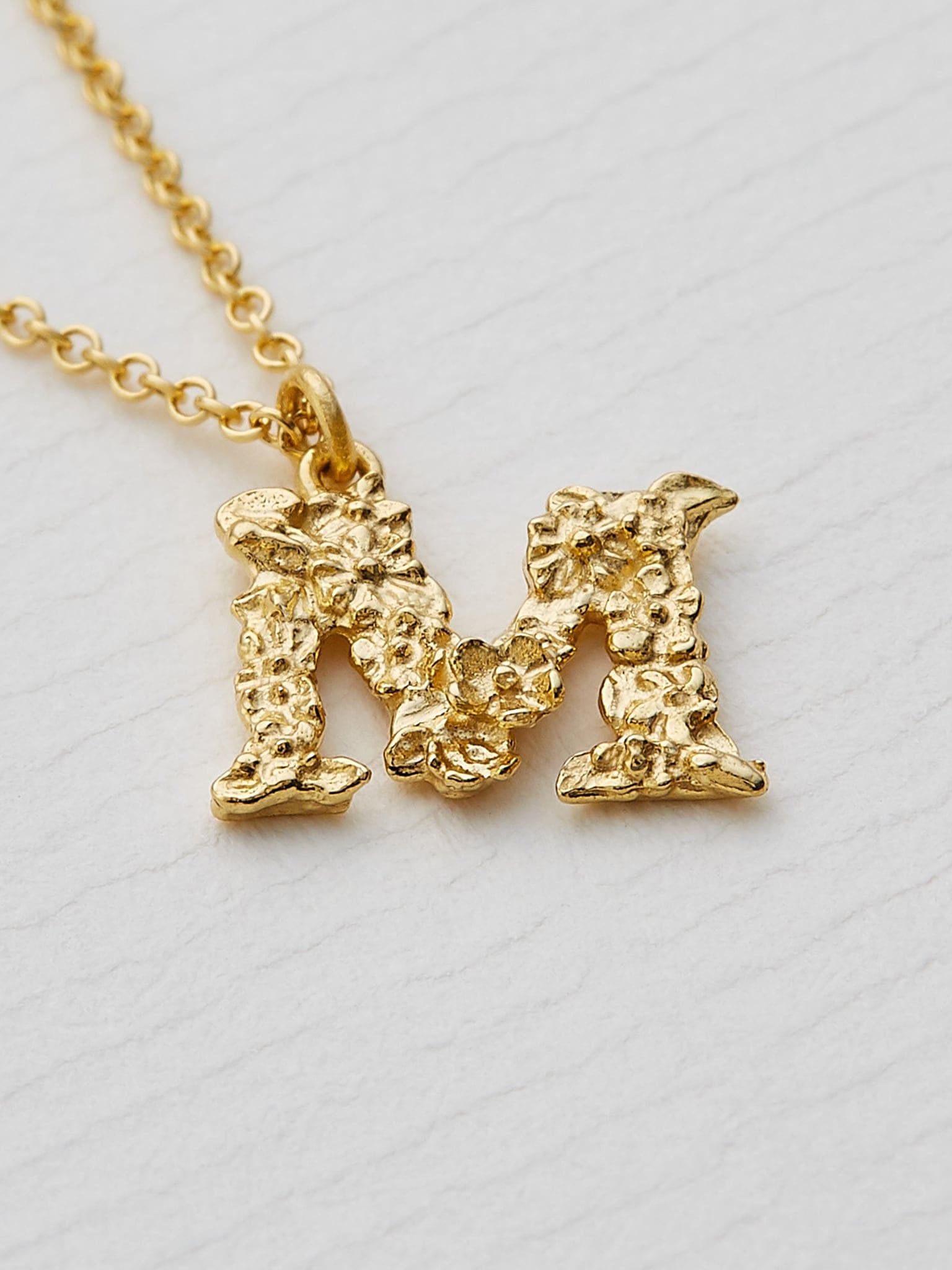 Teeny Tiny Floral Letter M Necklace - image 3 | 18ct yellow gold