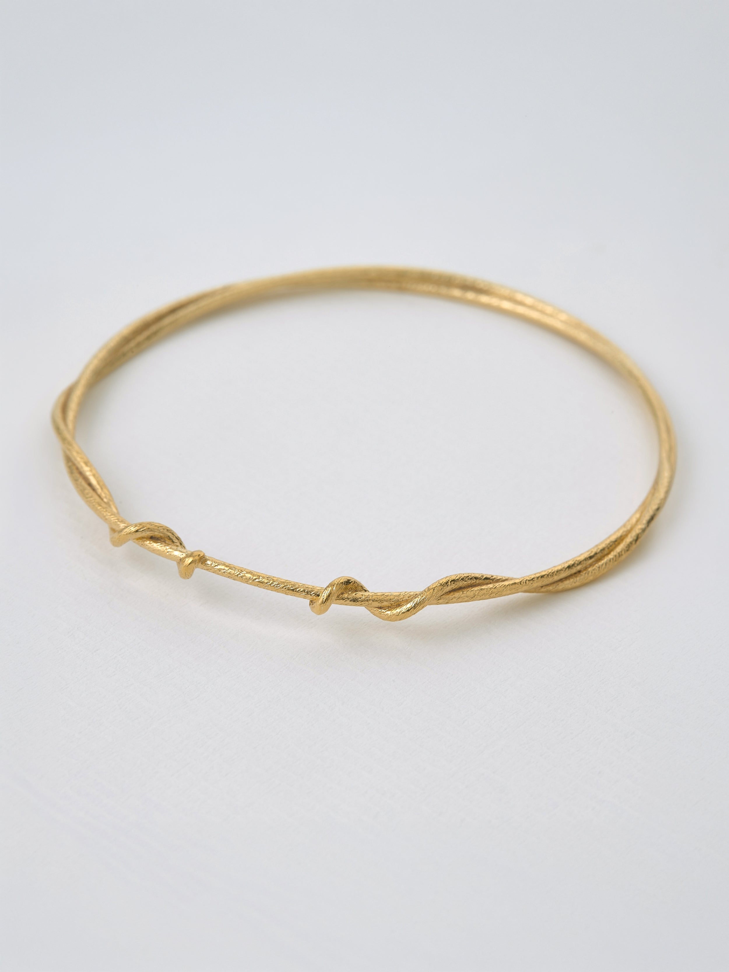 Twist Bangle - image 3 | gold plate