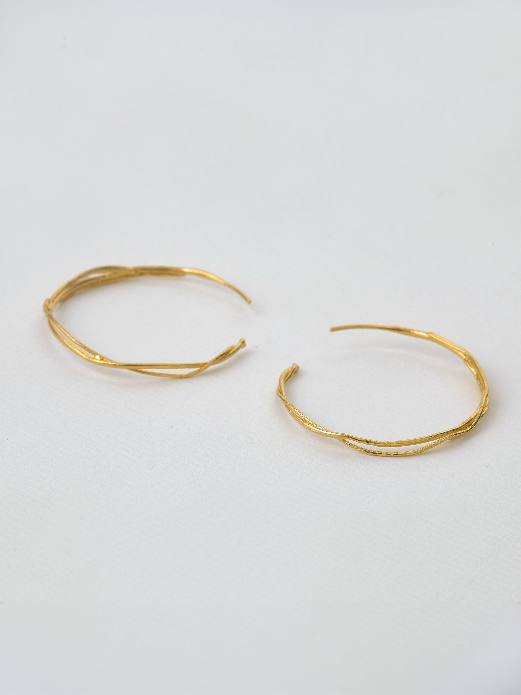 Fine Twist Hoop Earrings - image 3 | gold plate