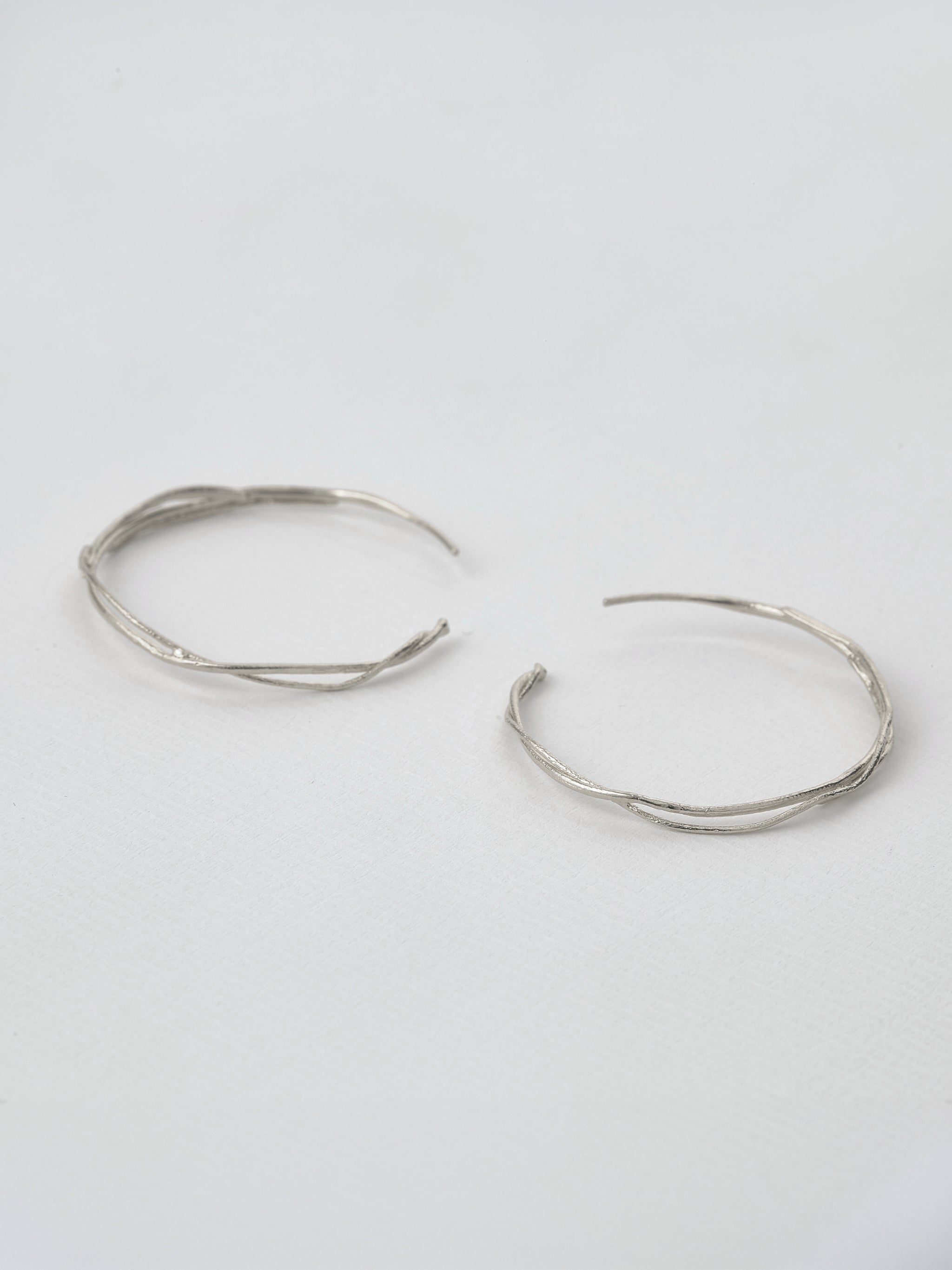 Fine Twist Hoop Earrings - image 5 | silver