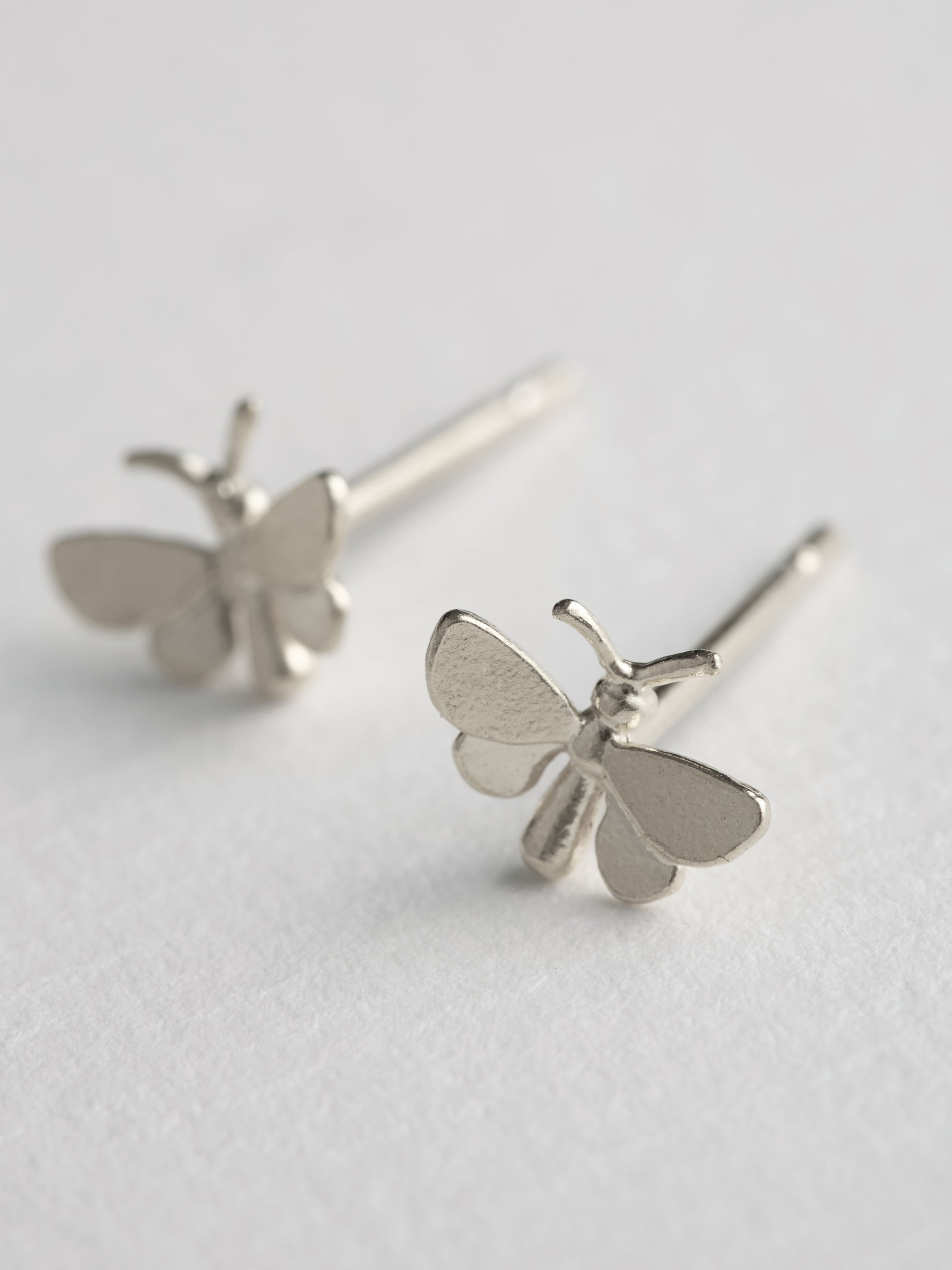 Tiny Butterfly Stud Earrings - image 4 | silver
