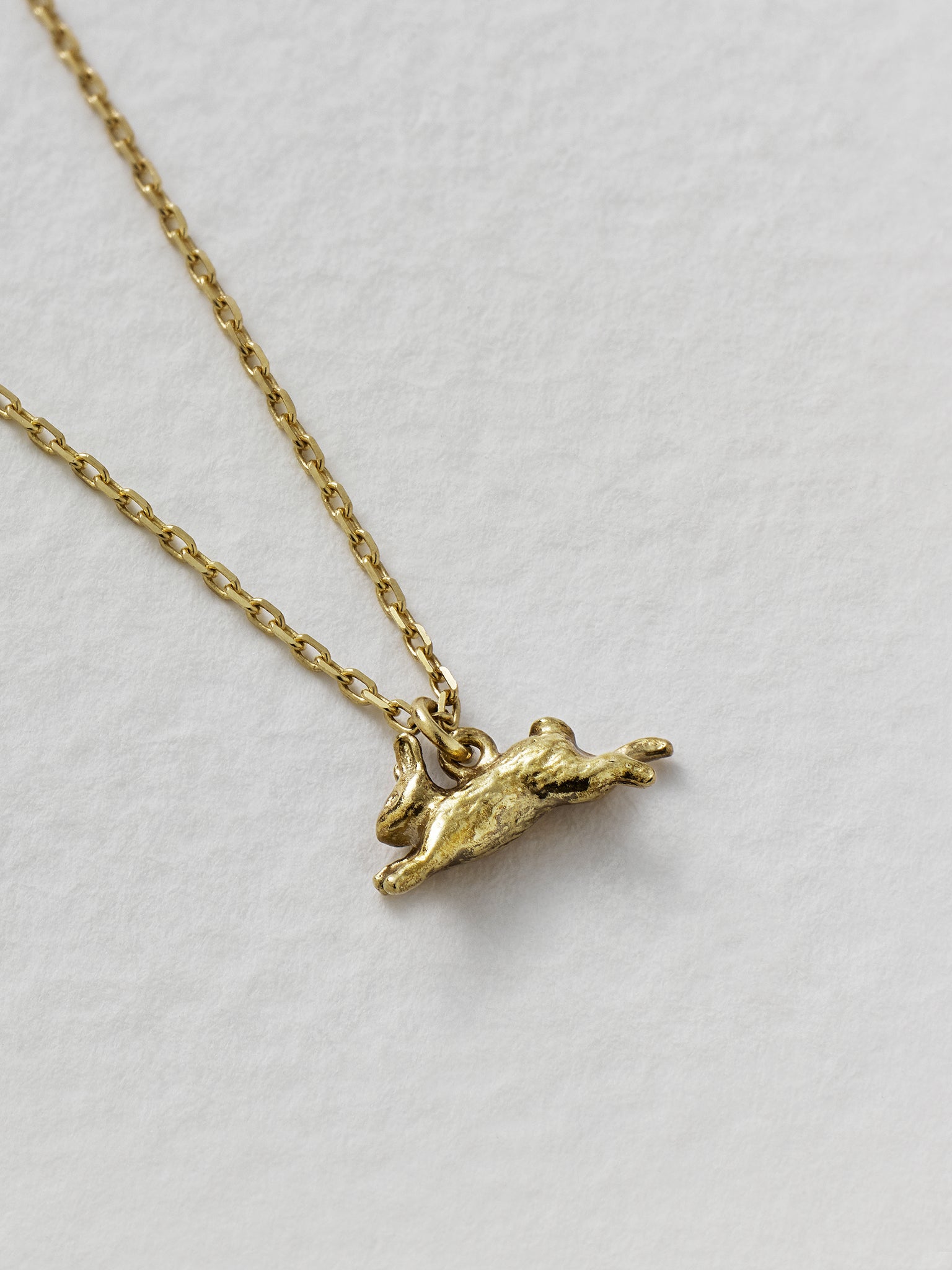 Teeny Tiny Leaping Rabbit Necklace - image 4 | 18ct yellow gold