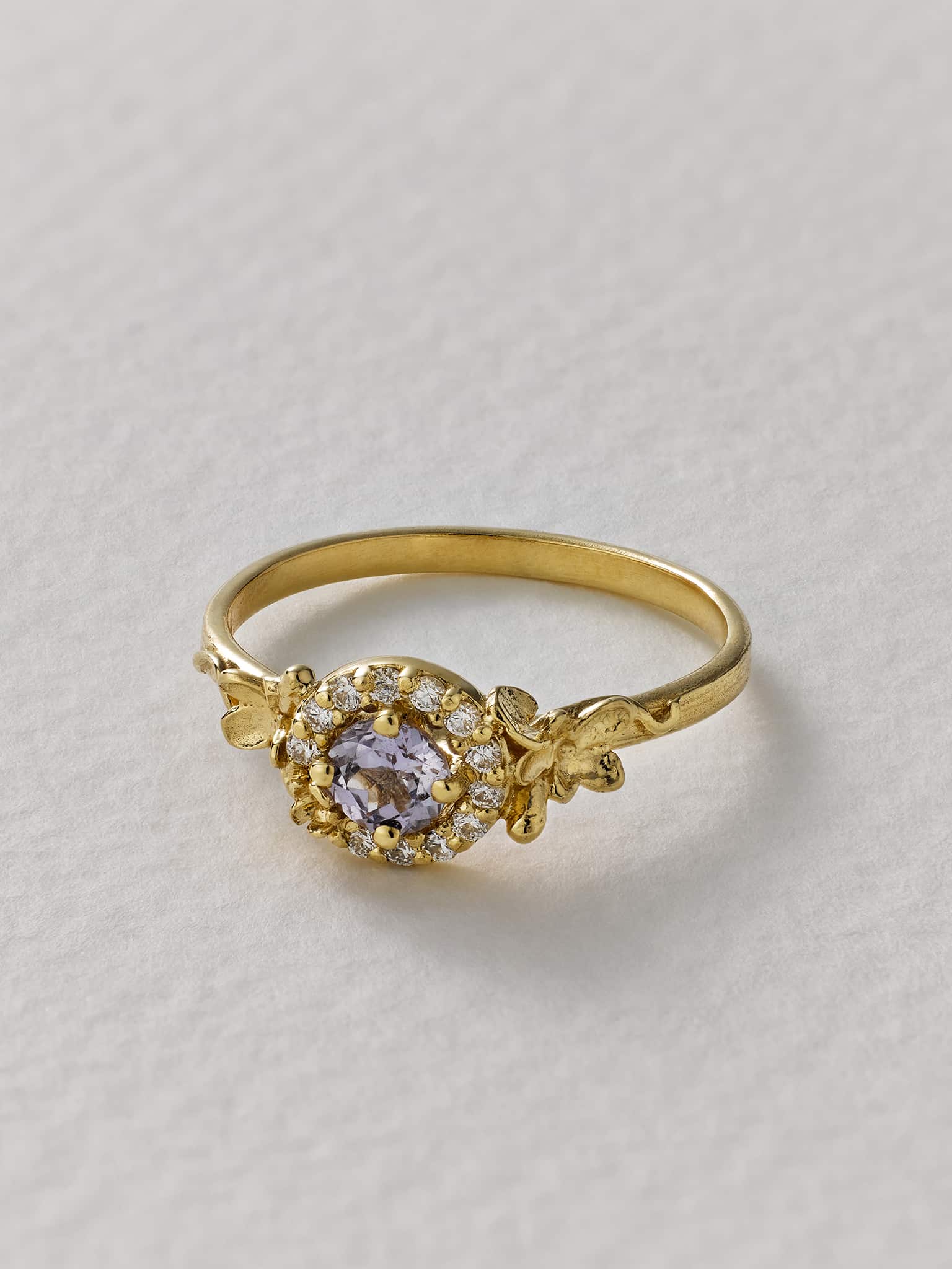 Small Spring Halo Lilac Pink Sapphire Ring - image 2 | 18ct yellow gold
