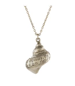 Silver Engraved Shell Necklace on Paper